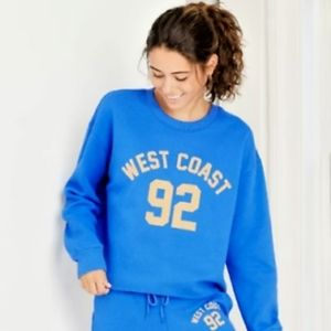 Zoe+Liv Blue Graphic Cropped Sweater